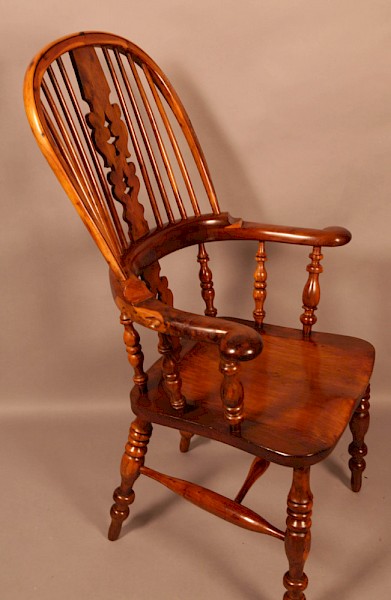 A Yew Wood Broad Arm Windsor chair Allsop Worksop