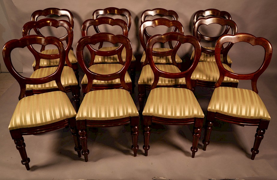 A Set of 12 Victorian Balloon Back Dining Chairs c 1860