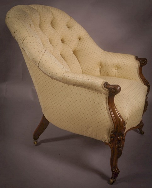 A Victorian library Chair in Walnut on Cabriole legs