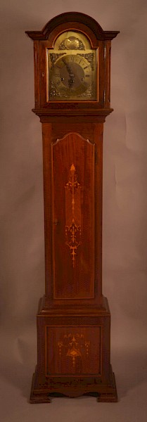 An 1920s Grandaughter longcase clock