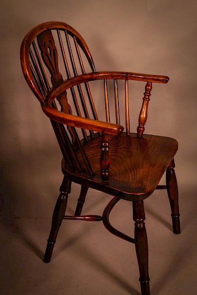 A Yew Wood low back Windsor Chair by Whitworth of Gamston
