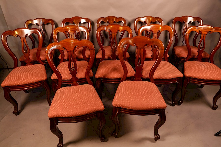 A Good set of 12 Victorian Mahogany Spear Point Balloon Back Dining Chairs