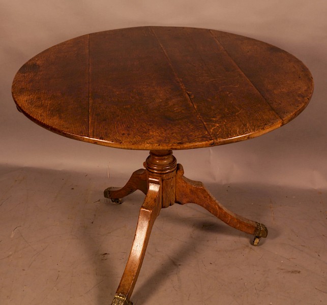 A Large Oak Tripod Supper Table