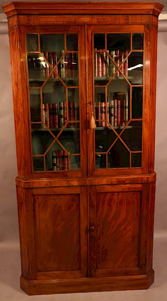 An 18th century Mahogany Full height corner Cupboard