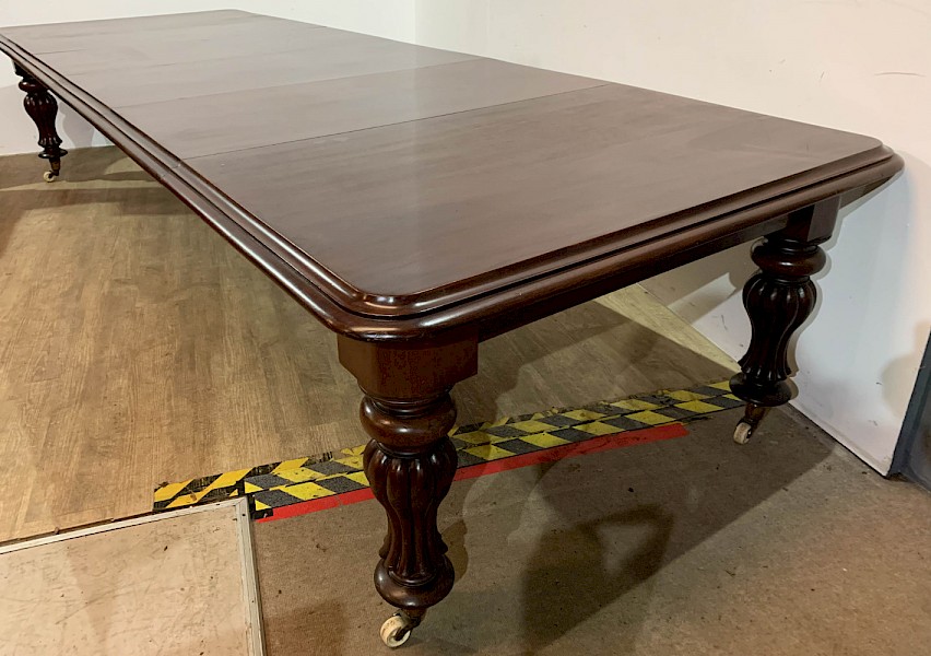 A Large Victorian Mahogany Dining Table seats 12/14