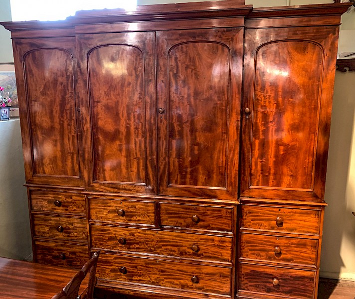 A Superb Early Victorian four door Wardrobe