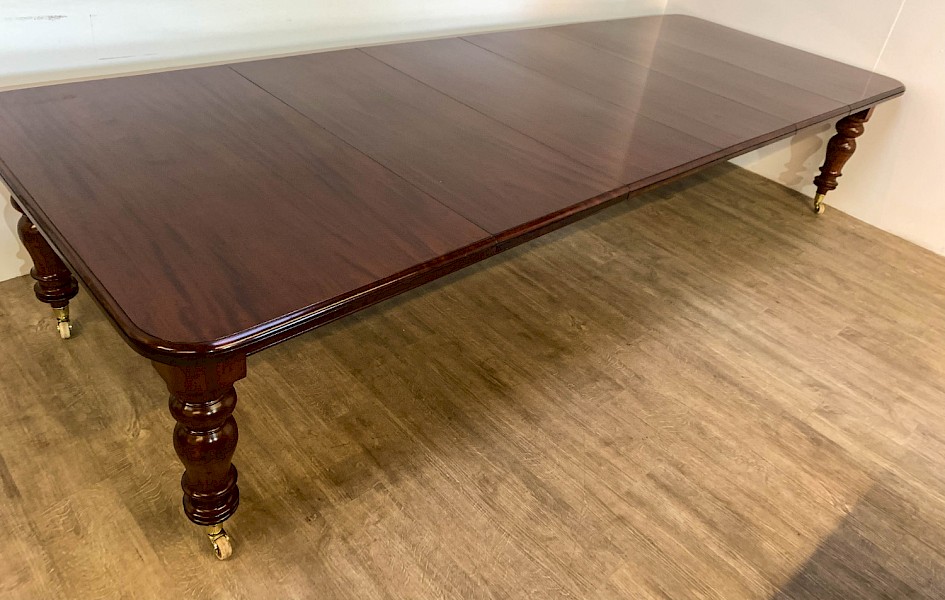 A Super Victorian Extending Dining Table in Mahogany seats up to 14