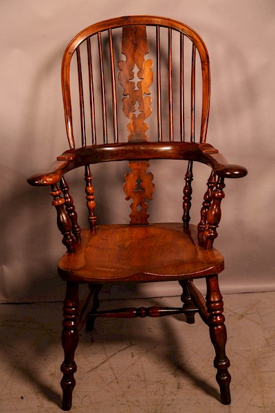 A Yew Wood Broad Arm Windsor Chair c 1860
