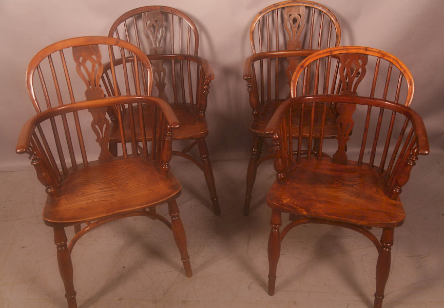 A Harlequin set of 4 Yew Wood Windsor Chairs