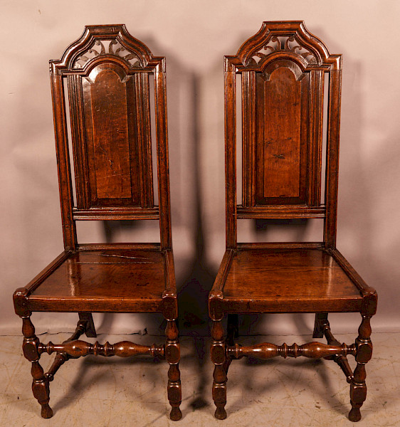 A Super pair of 17th century Oak Hall Chairs