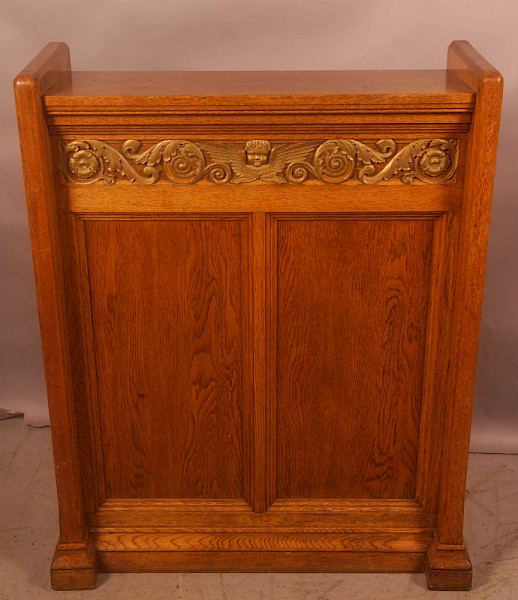 A late victorian Oak reading stand  with brass work