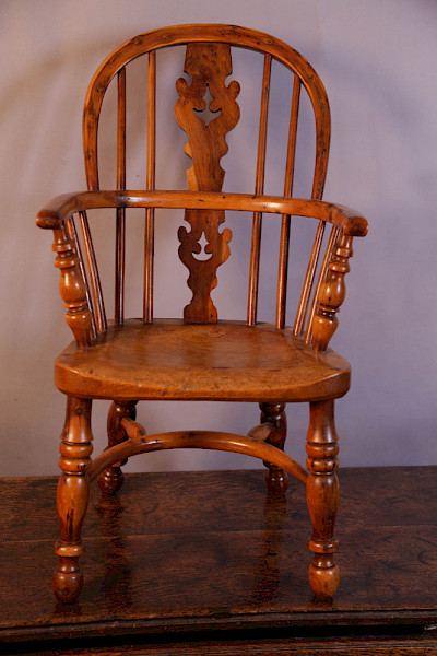 A Childs Yew Wood Windsor chair