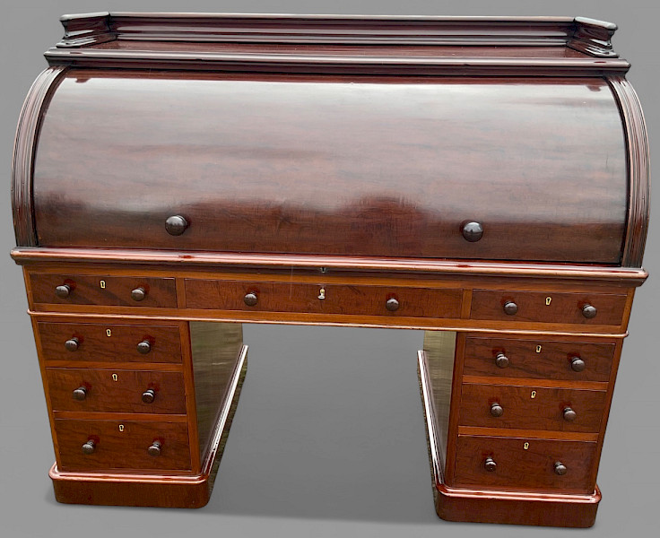 A very impressive and large 19th century cylinder desk