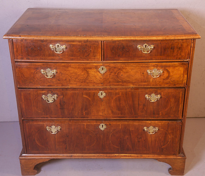 A George I chest of Drawers in figured Walnut